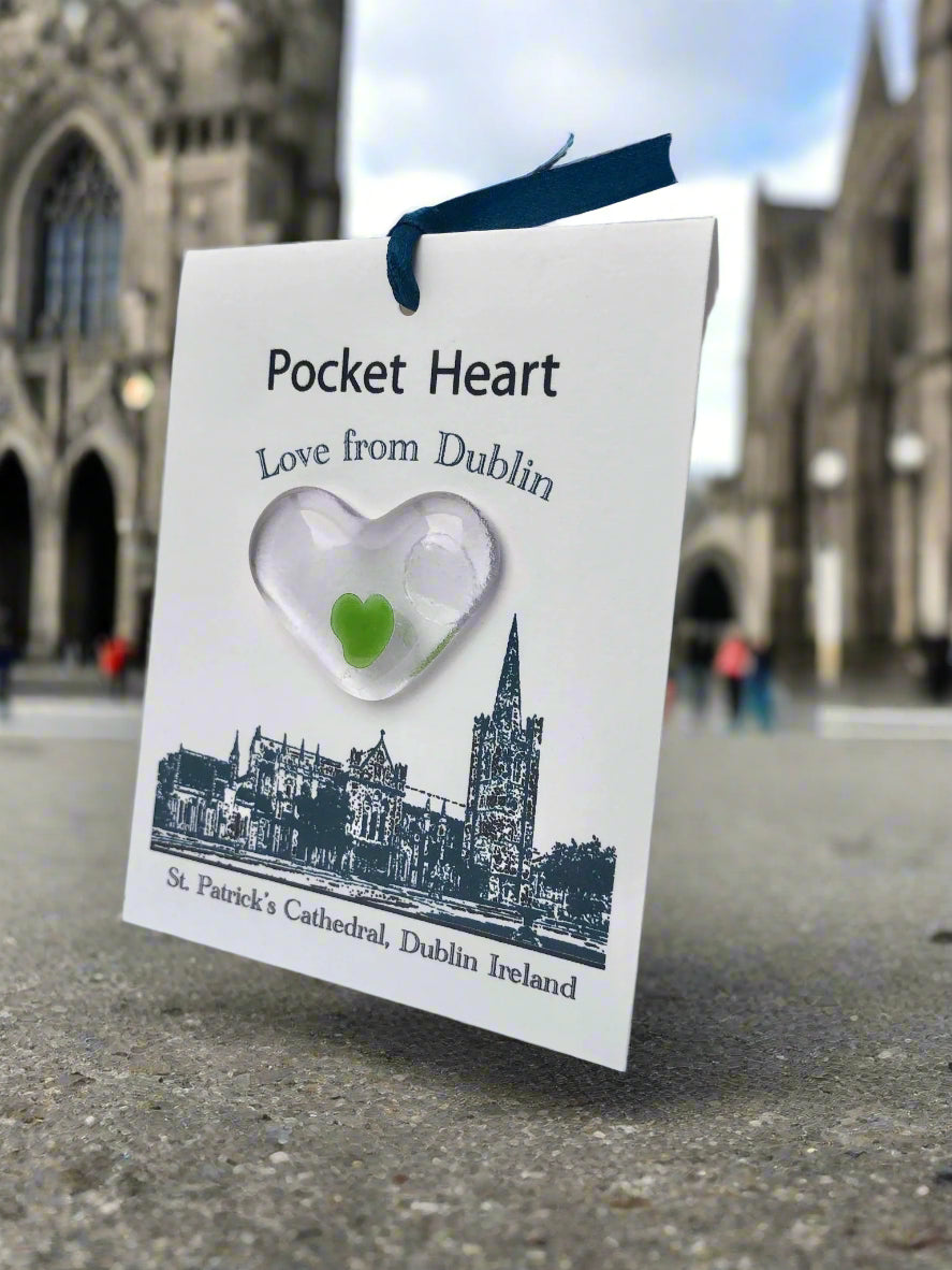 Heart-shaped object with a green heart inside, on a card with 'Pocket Heart Love from Dublin' text and St. Patrick's Cathedral illustration.